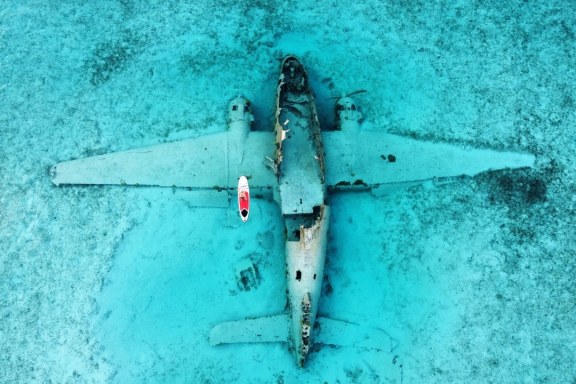Paddleboarding Around A Plane Wreck in the Exumas, Bahamas